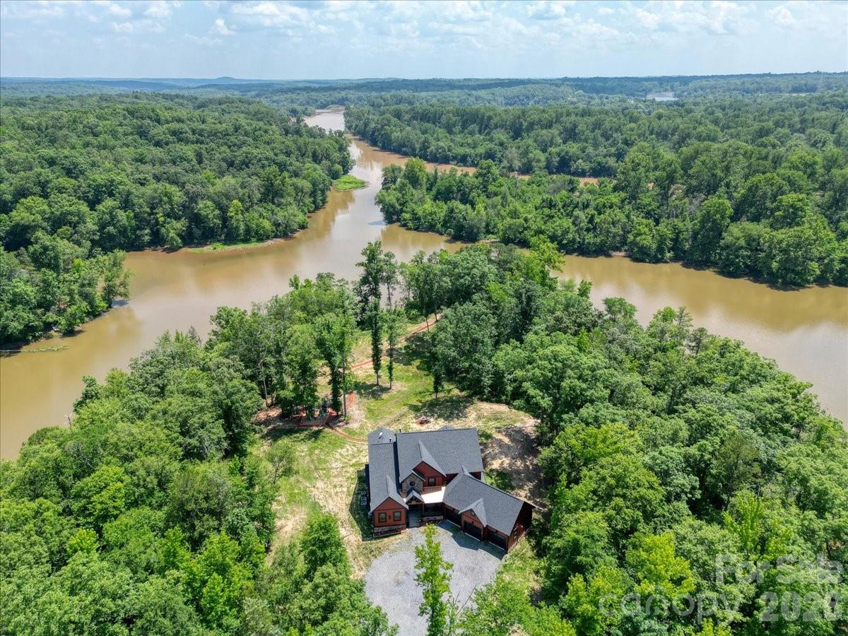 1194 99 Island Road Blacksburg, SC 29702 - Photo 43 of 47 an aerial view of a house with a yard and lake view