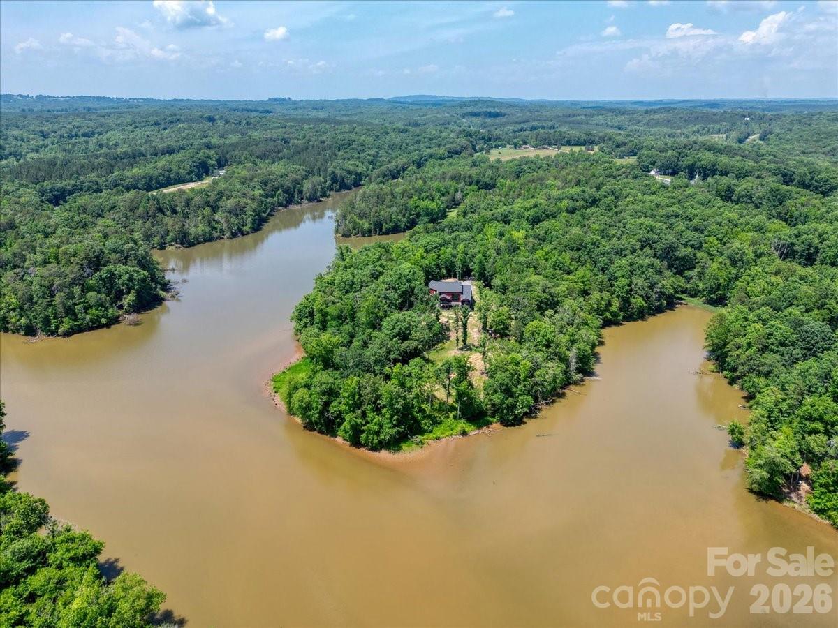 1194 99 Island Road Blacksburg, SC 29702 - Photo 44 of 47 an aerial view of a houses with a yard and lake view