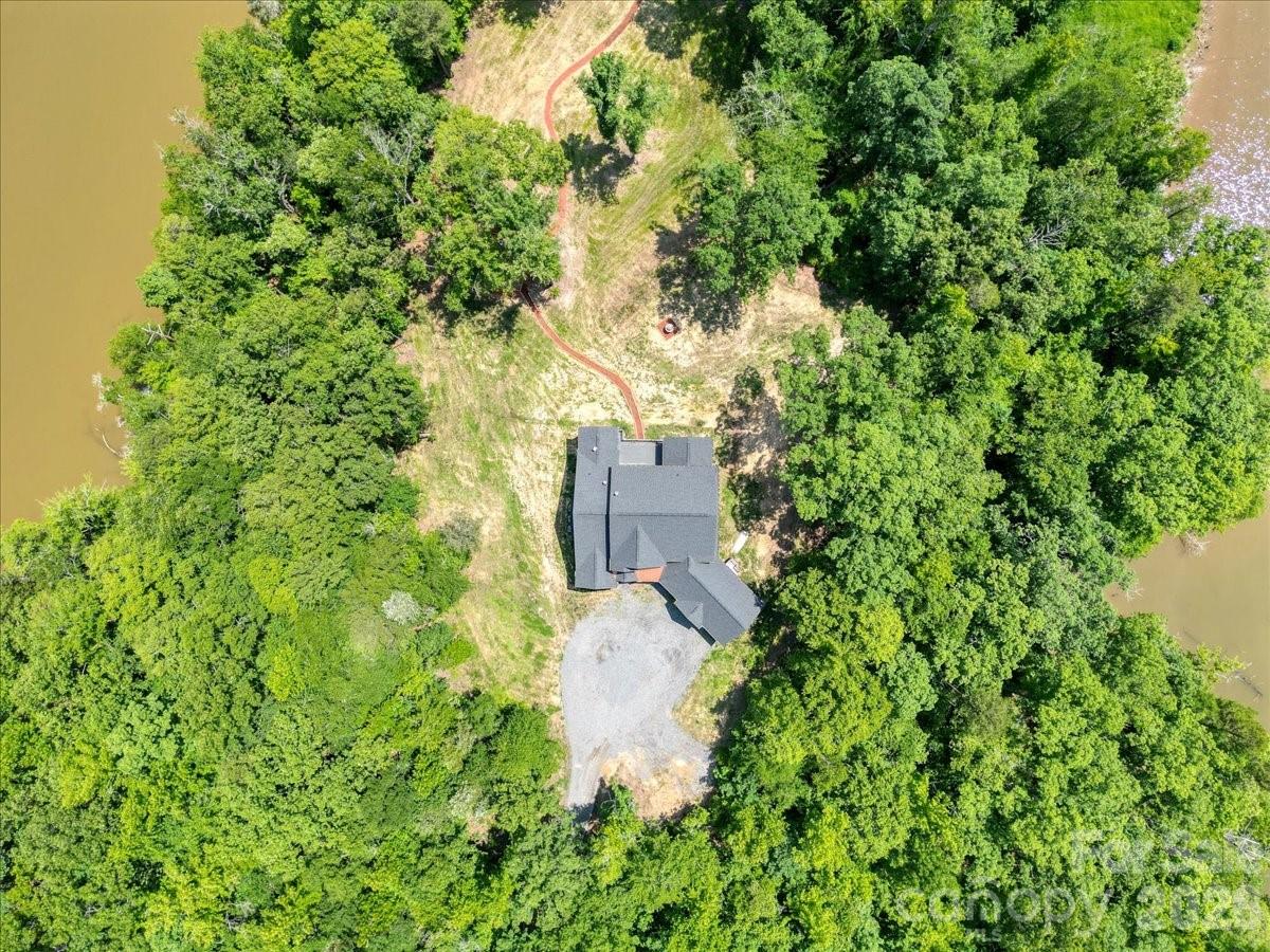 1194 99 Island Road Blacksburg, SC 29702 - Photo 46 of 47 an aerial view of a house with a yard and large tree