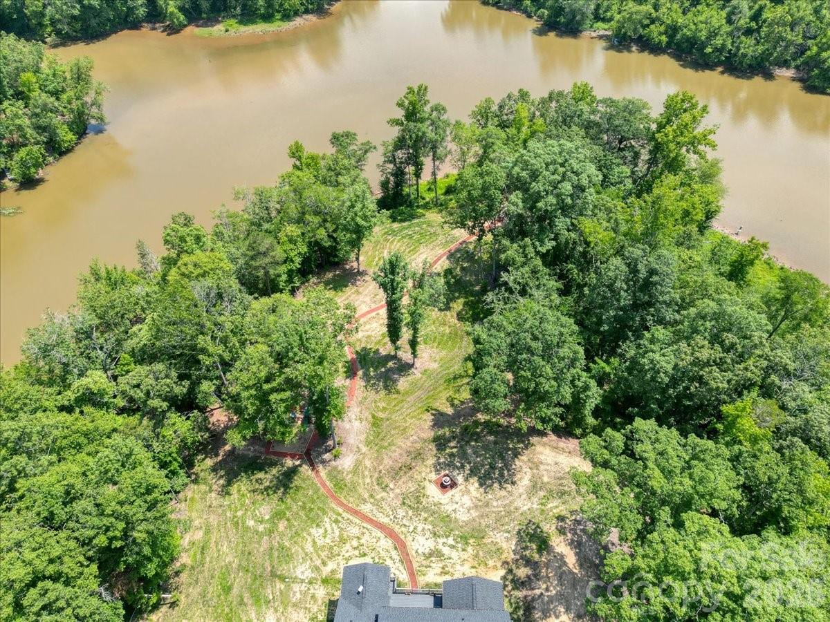 1194 99 Island Road Blacksburg, SC 29702 - Photo 47 of 47 a view of a lake with a house in the background