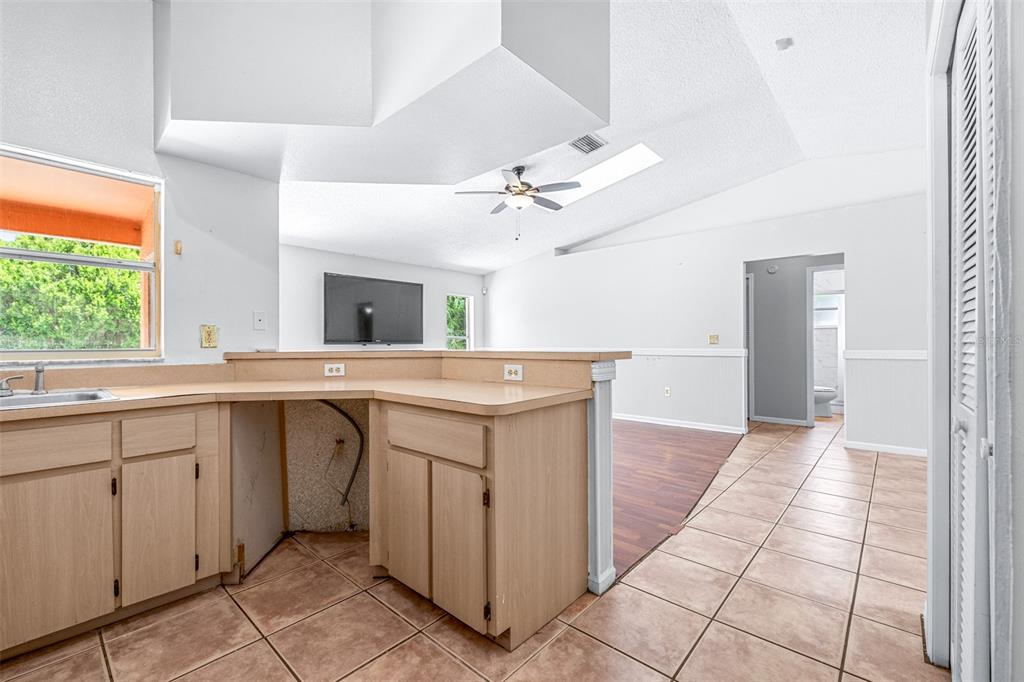 2538 Countryside Pines Drive Clearwater, FL 33761 - Photo 19 of 61 a kitchen with a sink and cabinets