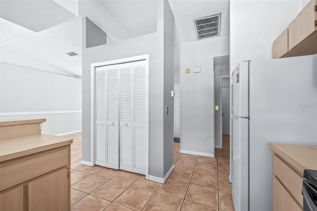 2538 Countryside Pines Drive Clearwater, FL 33761 - Photo 20 of 61 a view of a kitchen from the hallway
