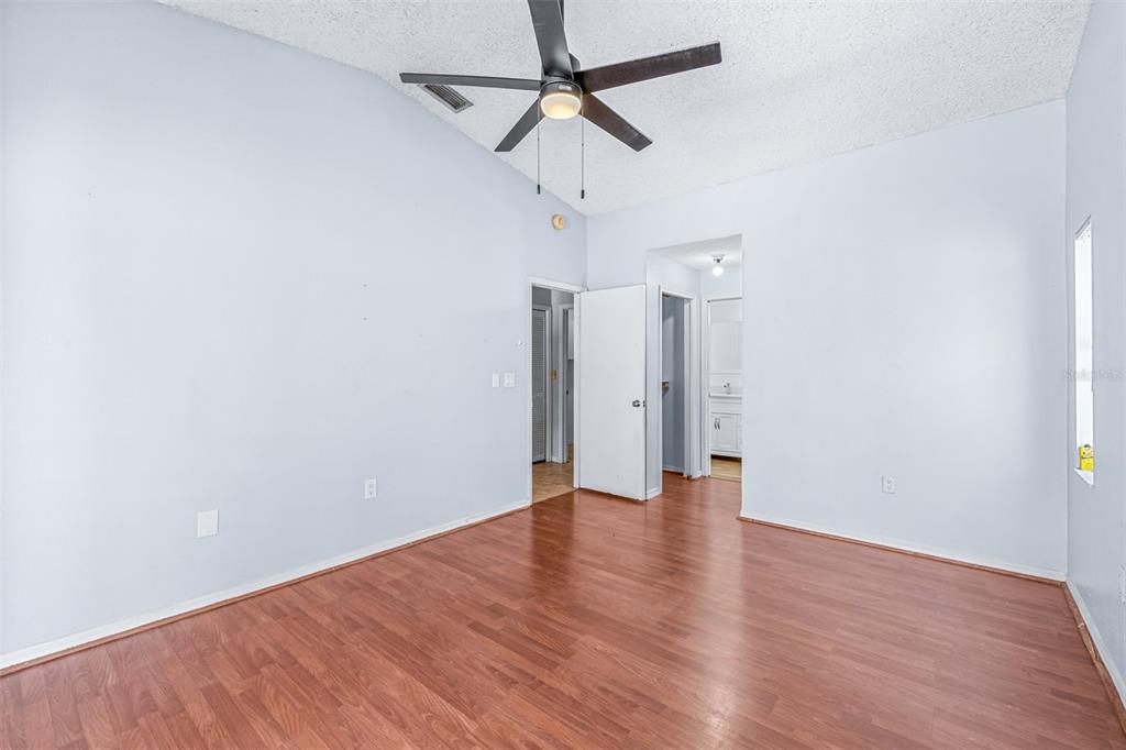 2538 Countryside Pines Drive Clearwater, FL 33761 - Photo 22 of 61 a view of an empty room with a fan