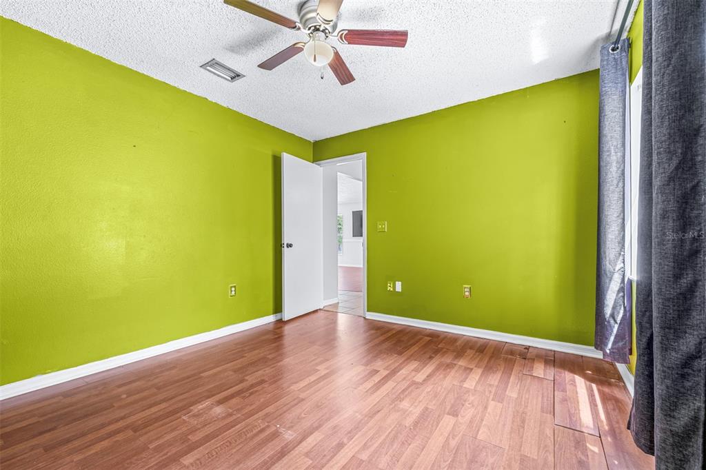 2538 Countryside Pines Drive Clearwater, FL 33761 - Photo 35 of 61 a view of a big room with wooden floor