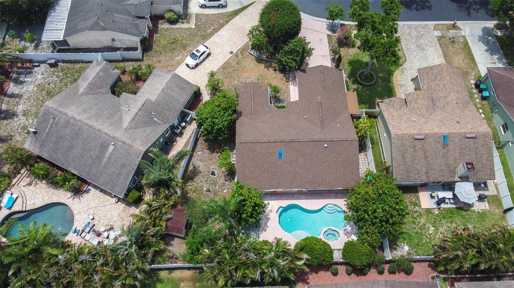 2538 Countryside Pines Drive Clearwater, FL 33761 - Photo 55 of 61 an aerial view of multiple houses with outdoor space