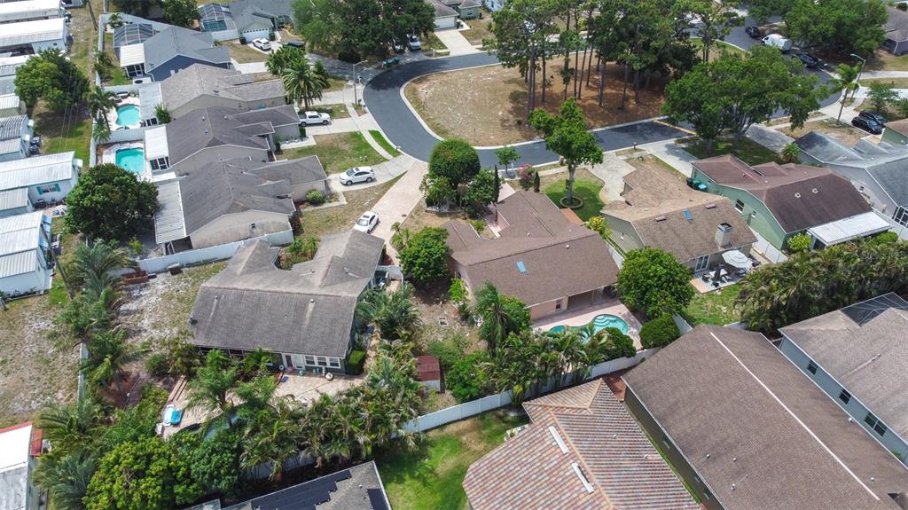 2538 Countryside Pines Drive Clearwater, FL 33761 - Photo 58 of 61 an aerial view of a house with outdoor space and street view