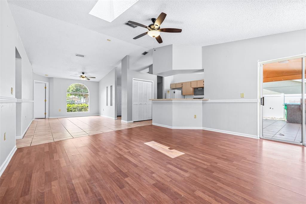 2538 Countryside Pines Drive Clearwater, FL 33761 - Photo 10 of 61 a view of empty room with wooden floor and fan