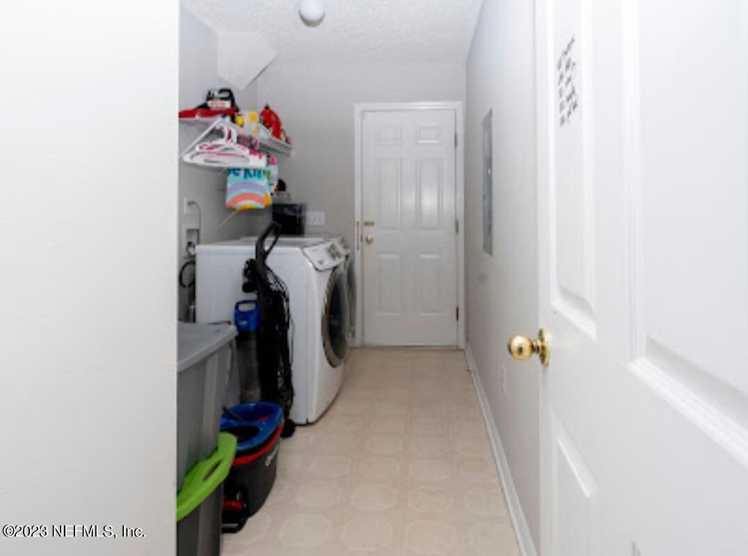 2504 Mallory Hills Road Jacksonville, FL 32221 - Photo 11 of 30 a view of storage and utility room with a window