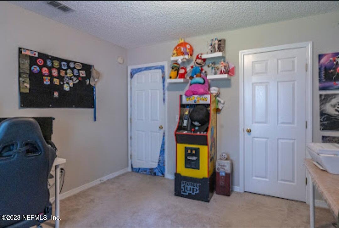 2504 Mallory Hills Road Jacksonville, FL 32221 - Photo 19 of 30 a room with storage and utility