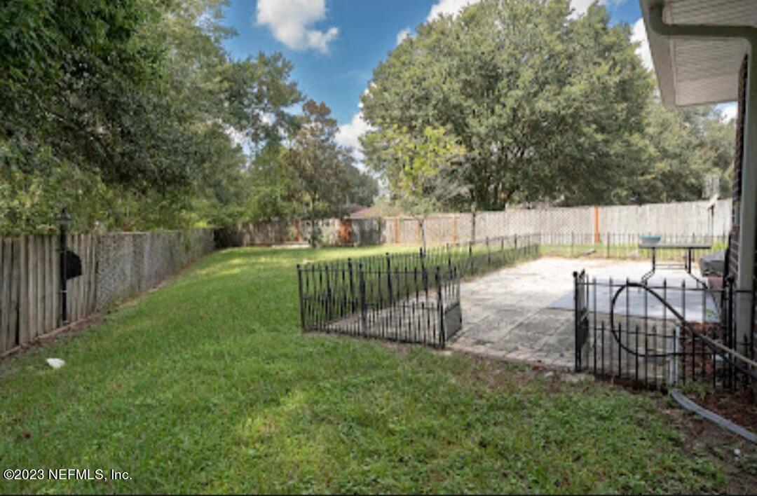 2504 Mallory Hills Road Jacksonville, FL 32221 - Photo 29 of 30 a view of a park with iron fence