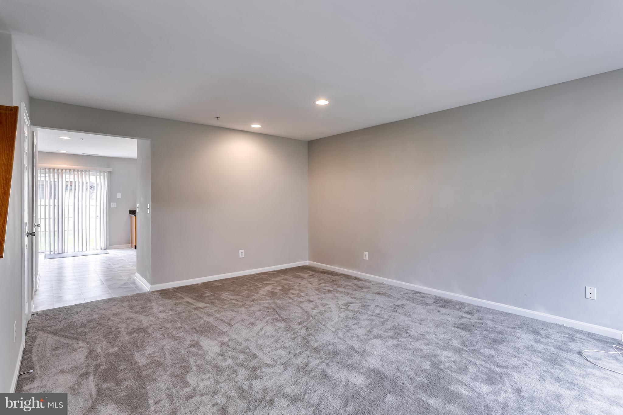 673 Hunting Fields Road Baltimore, MD 21220 - Photo 6 of 31 a view of hallway with a large window