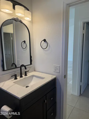 an empty room with a empty space and a window