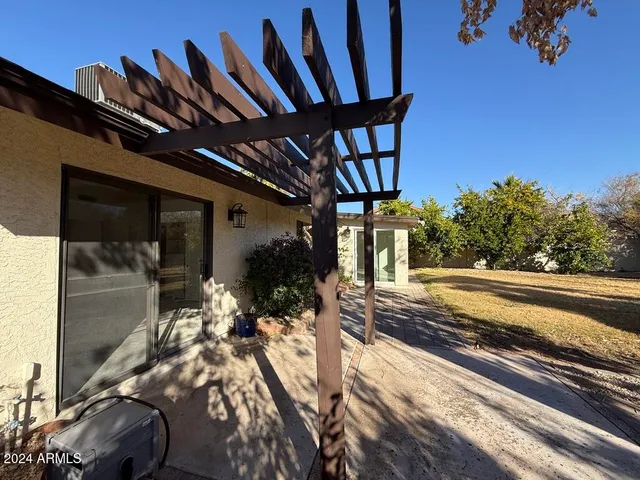 a view of path along with flower plants