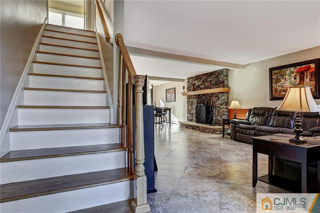 26 Pleasant Valley Road Old Bridge, NJ 08857 - Photo 3 of 25 a view of entryway and hall with wooden floor