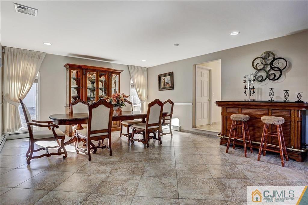 26 Pleasant Valley Road Old Bridge, NJ 08857 - Photo 21 of 25 a view of a dining room with furniture