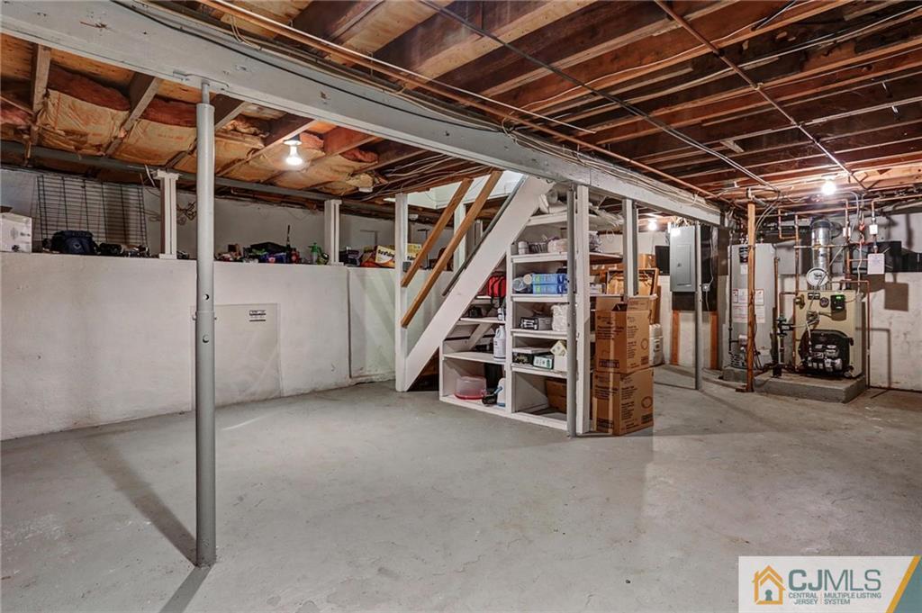 26 Pleasant Valley Road Old Bridge, NJ 08857 - Photo 22 of 25 a view of an empty room with stairs