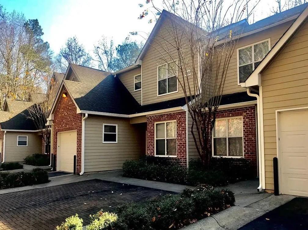 1600 Blairs Bridge Road, Unit 1701 Lithia Springs, GA 30122 - Photo 21 of 21 a front view of a house with a yard