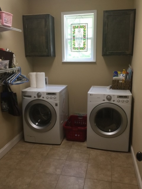 7813 Zebulon Road Macon, GA 31220 - Photo 11 of 21 a utility room with sink washer and dryer