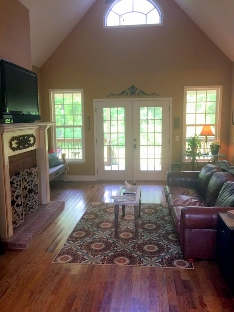 7813 Zebulon Road Macon, GA 31220 - Photo 3 of 21 a living room with furniture and a flat screen tv