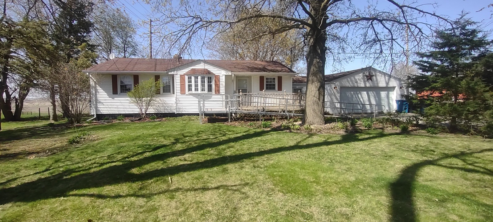 2 Holly Road Sterling, IL 61081 - Photo 1 of 19 a front view of a house with a yard