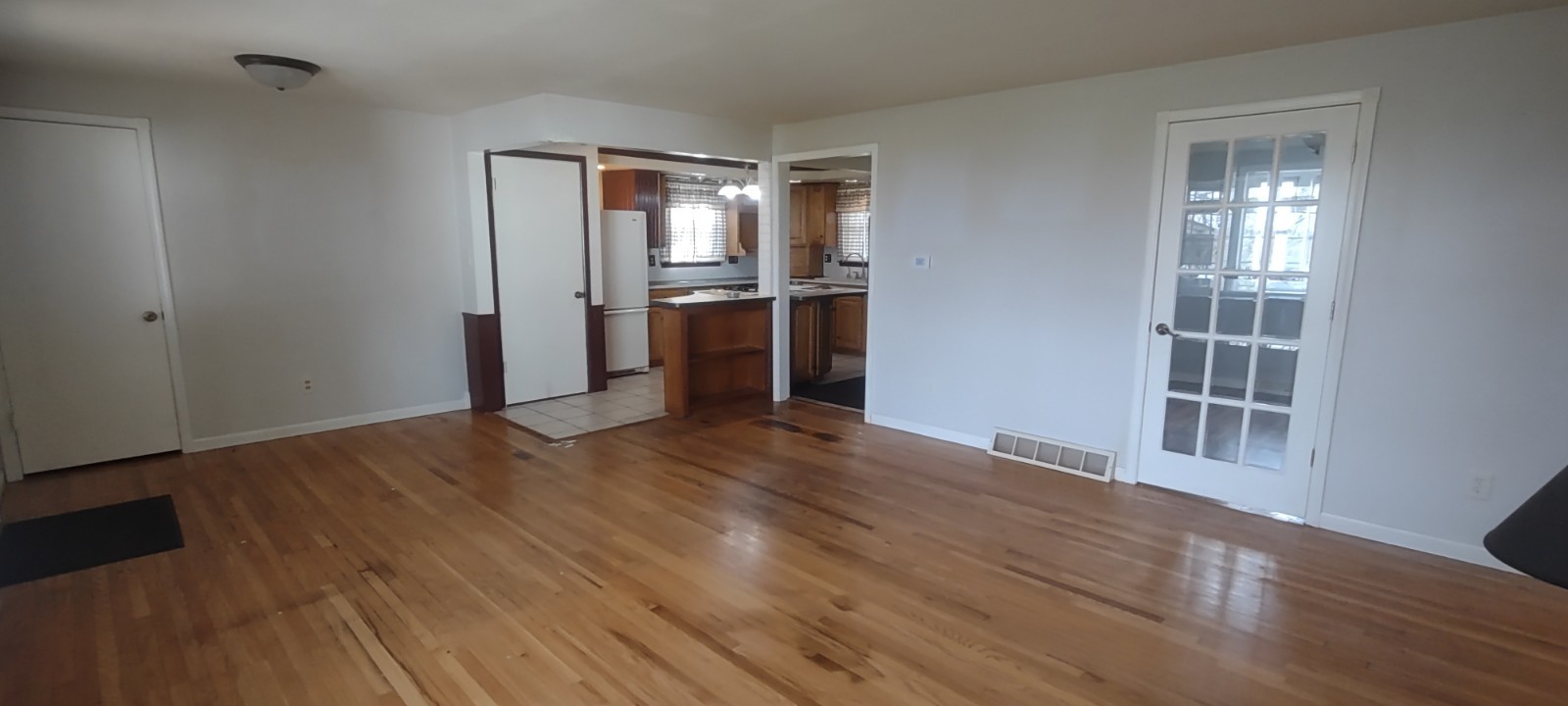 2 Holly Road Sterling, IL 61081 - Photo 6 of 19 a view of empty room with kitchen and window
