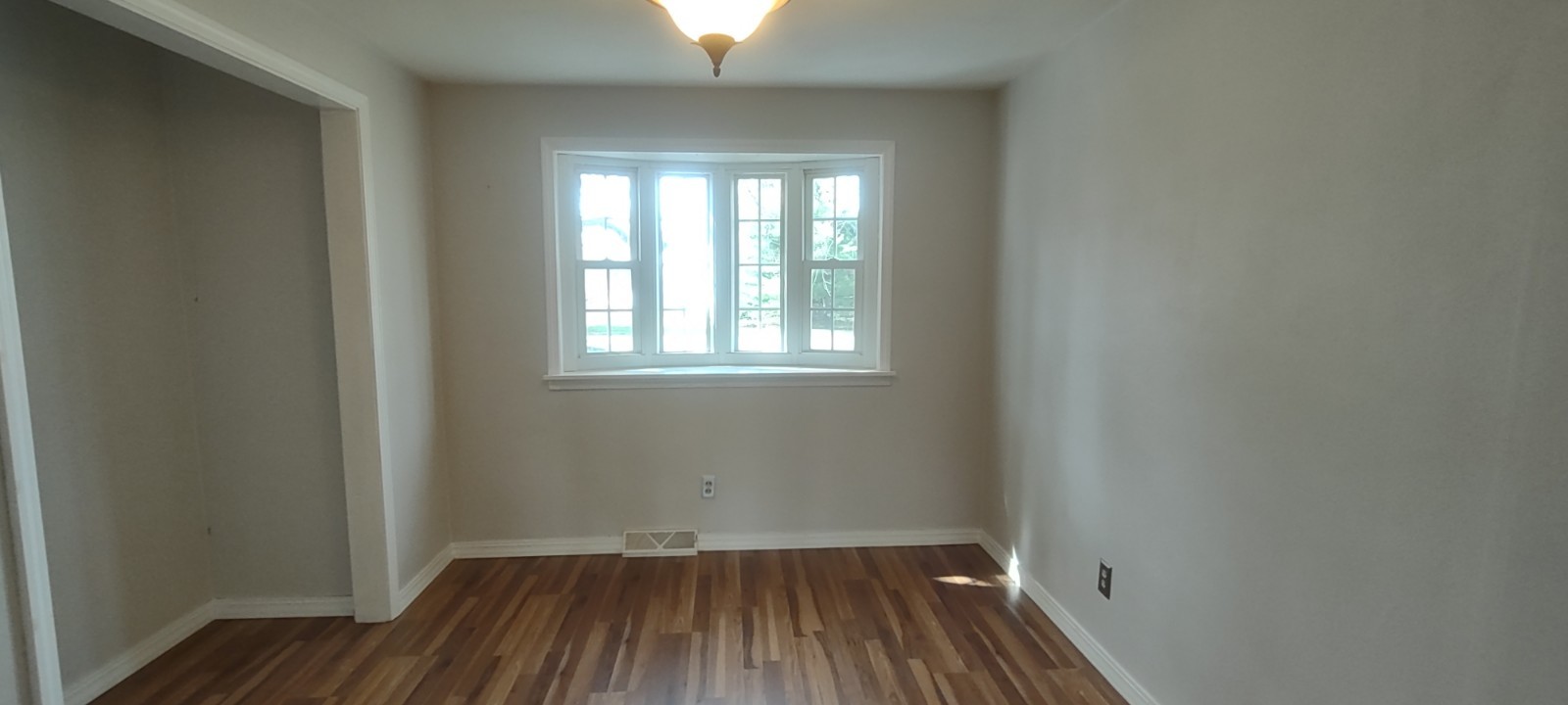 2 Holly Road Sterling, IL 61081 - Photo 8 of 19 a view of a room with wooden floor and windows