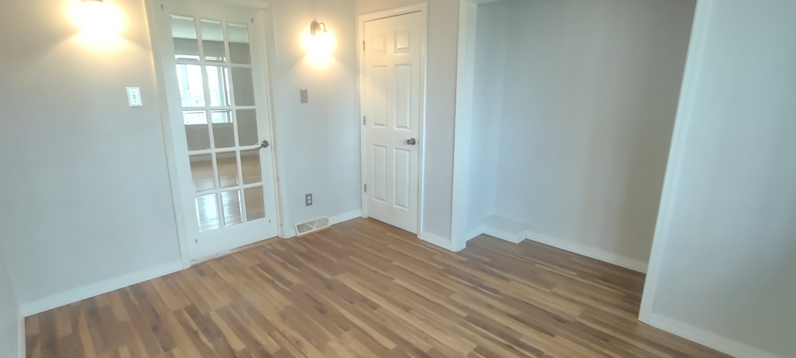 2 Holly Road Sterling, IL 61081 - Photo 9 of 19 a view of empty room with wooden floor and entryway