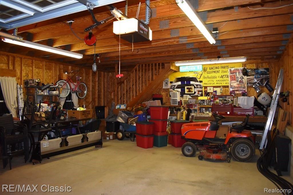 365 East Dawson Road Milford, MI 48381 - Photo 49 of 57 Work bench in 2nd garage stays. Stairway to upper loft