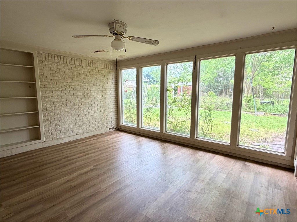 2711 Forest Trail Temple, TX 76502 - Photo 12 of 22 a view of room with window and wooden floor