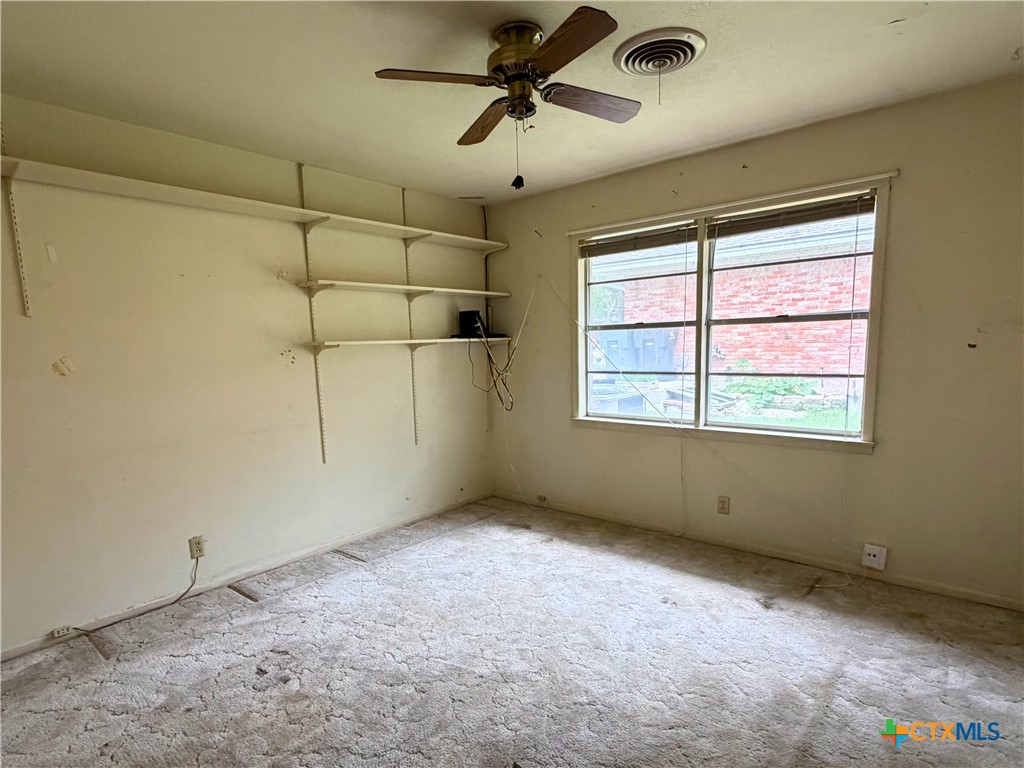 2711 Forest Trail Temple, TX 76502 - Photo 17 of 22 a view of a room with windows and ceiling fan