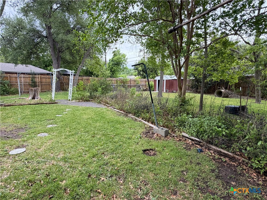 2711 Forest Trail Temple, TX 76502 - Photo 22 of 22 a view of a backyard with large trees and plants