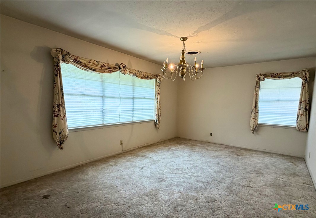 2711 Forest Trail Temple, TX 76502 - Photo 4 of 22 en empty room with windows