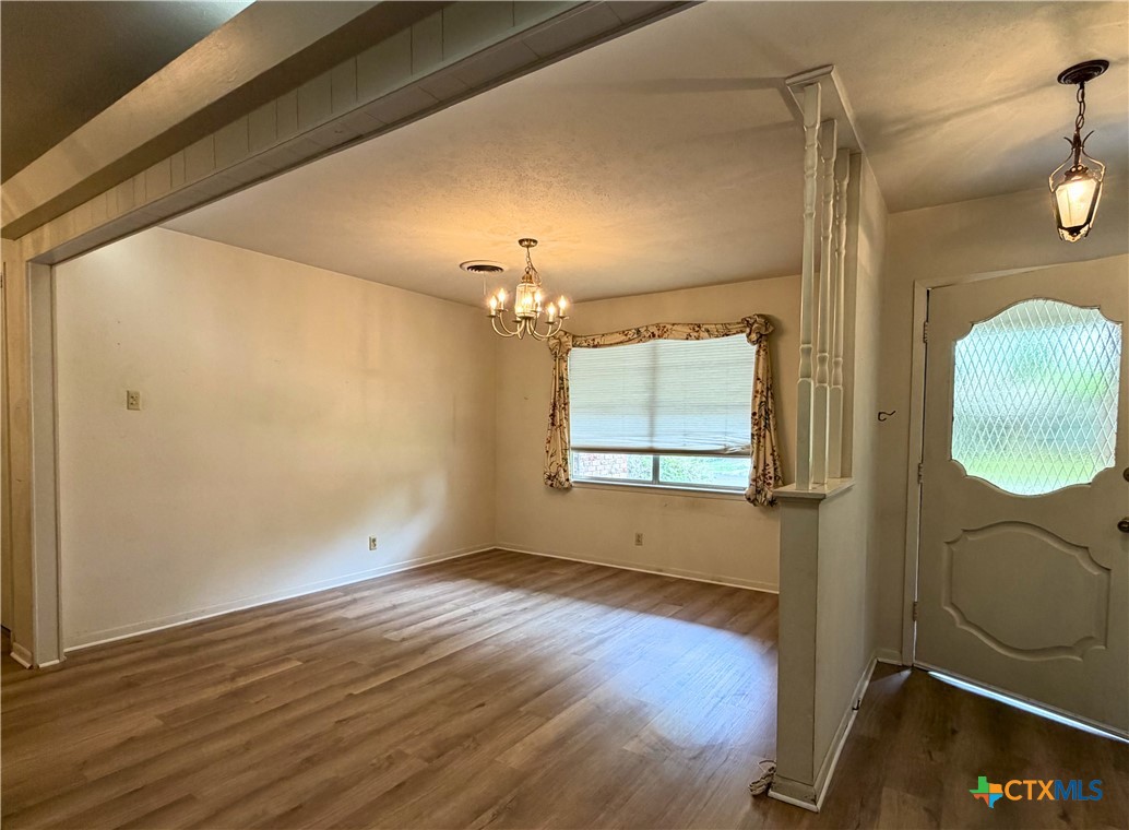 2711 Forest Trail Temple, TX 76502 - Photo 5 of 22 a view of livingroom with hardwood floor and window