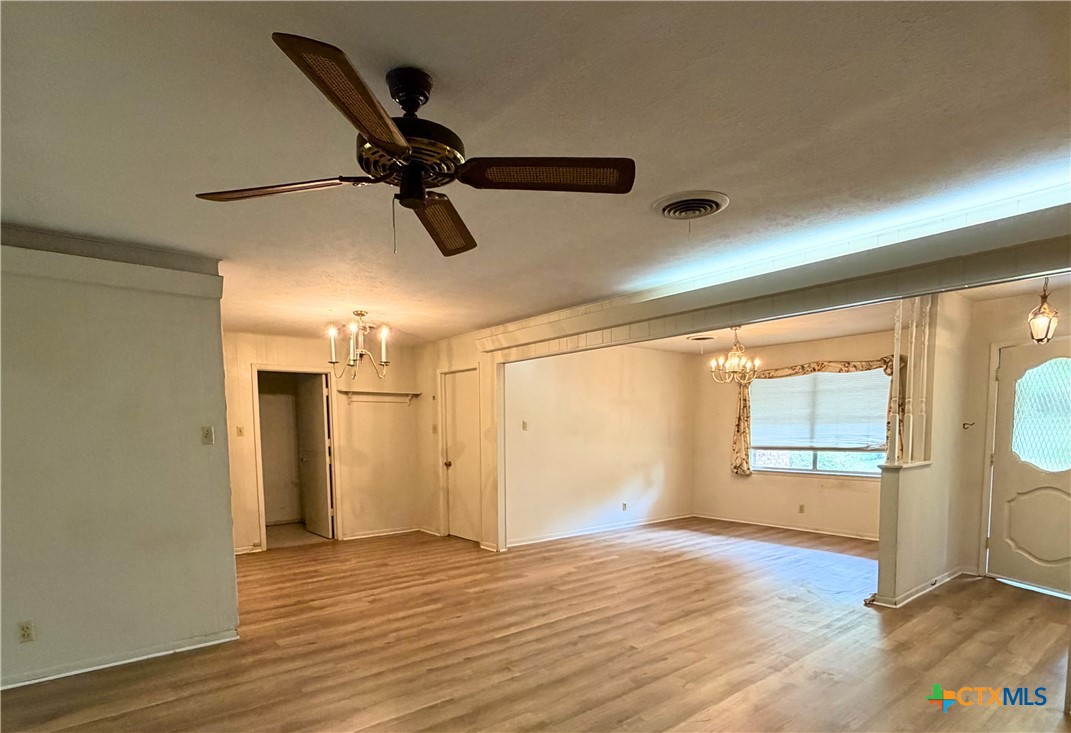 2711 Forest Trail Temple, TX 76502 - Photo 7 of 22 a view of empty room with wooden floor and fan