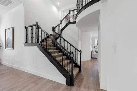 a view of entryway with wooden floor