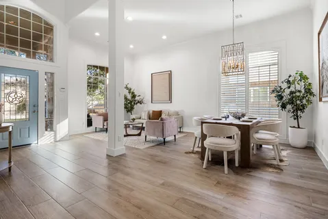 a view of a livingroom with furniture and window