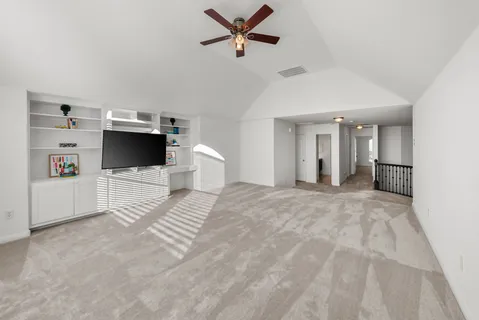 a view of a livingroom with a flat screen tv