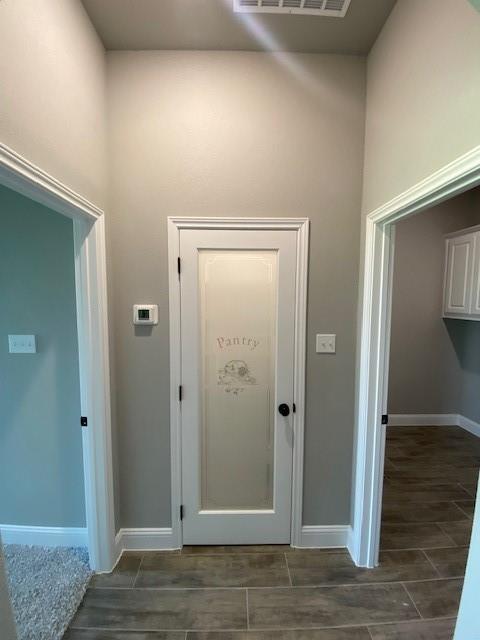 2001 Donna Court Azle, TX 76020 - Photo 11 of 20 an empty room with wooden floor and closet