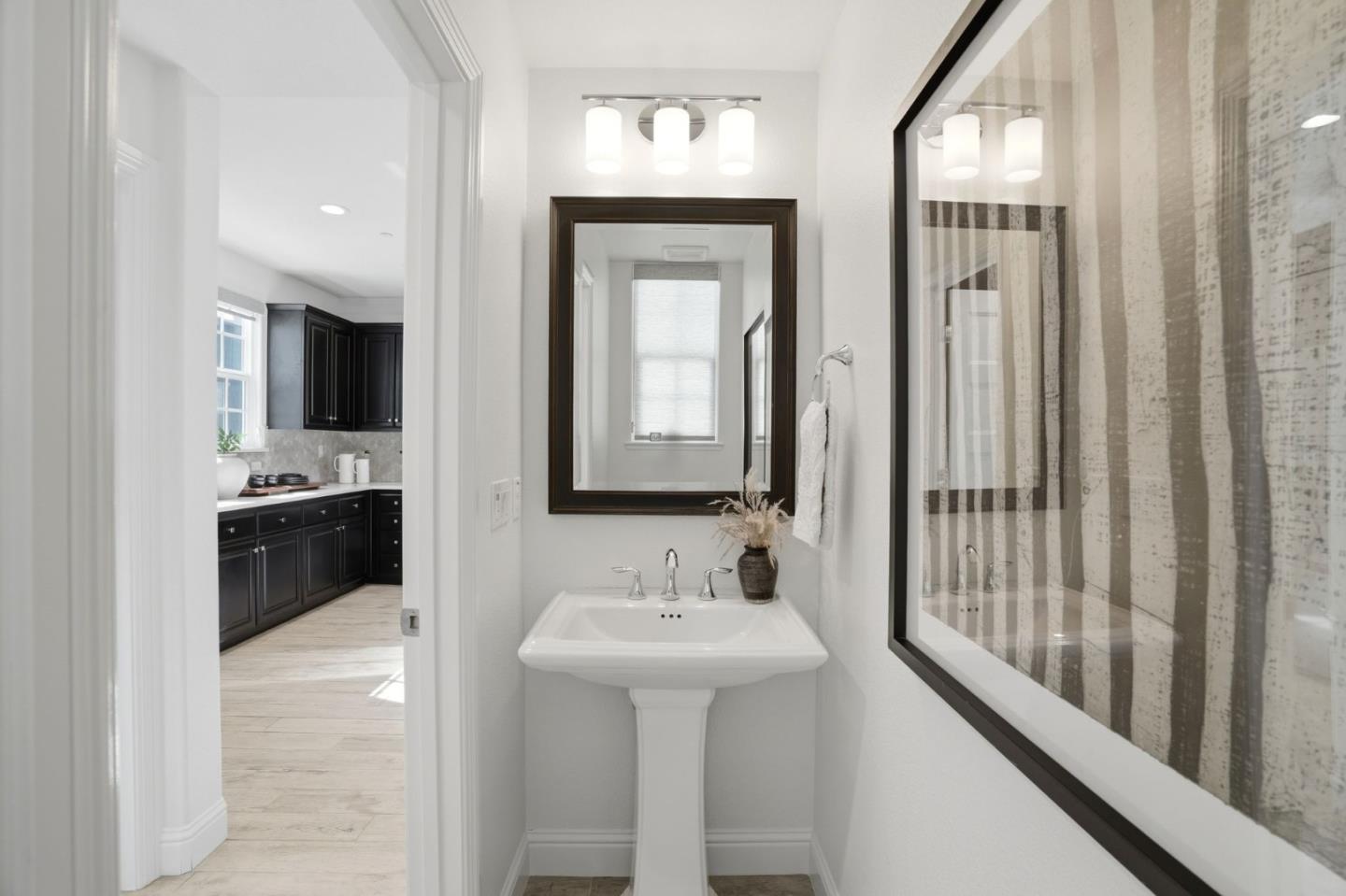 3806 Pyramid Way Mountain View, CA 94043 - Photo 16 of 44 a bathroom with a sink double vanity and a mirror