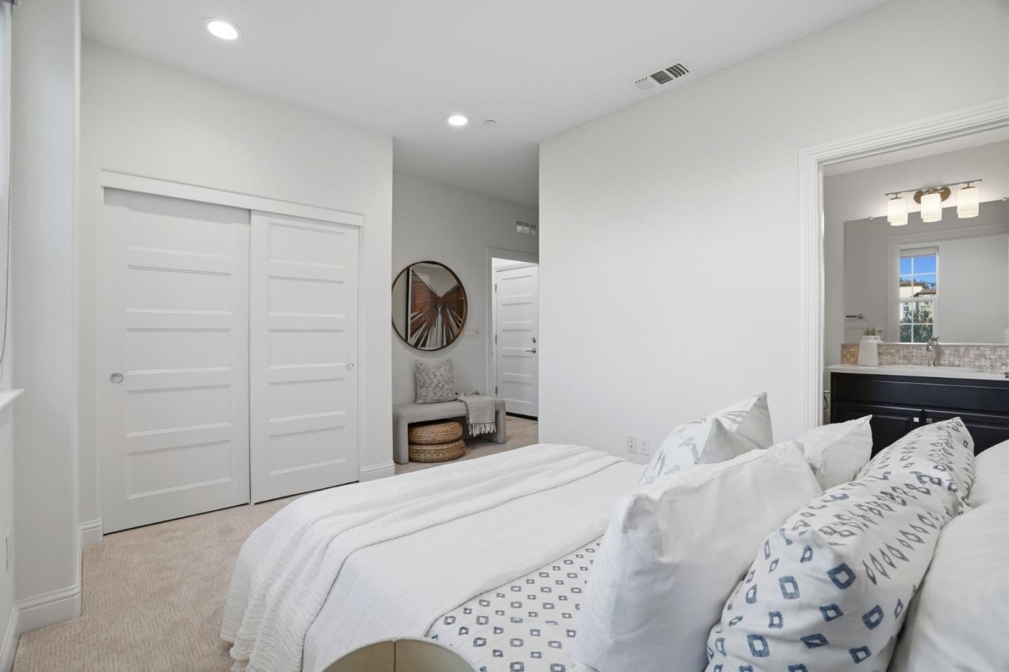 3806 Pyramid Way Mountain View, CA 94043 - Photo 19 of 44 a bedroom with a bed and lamp