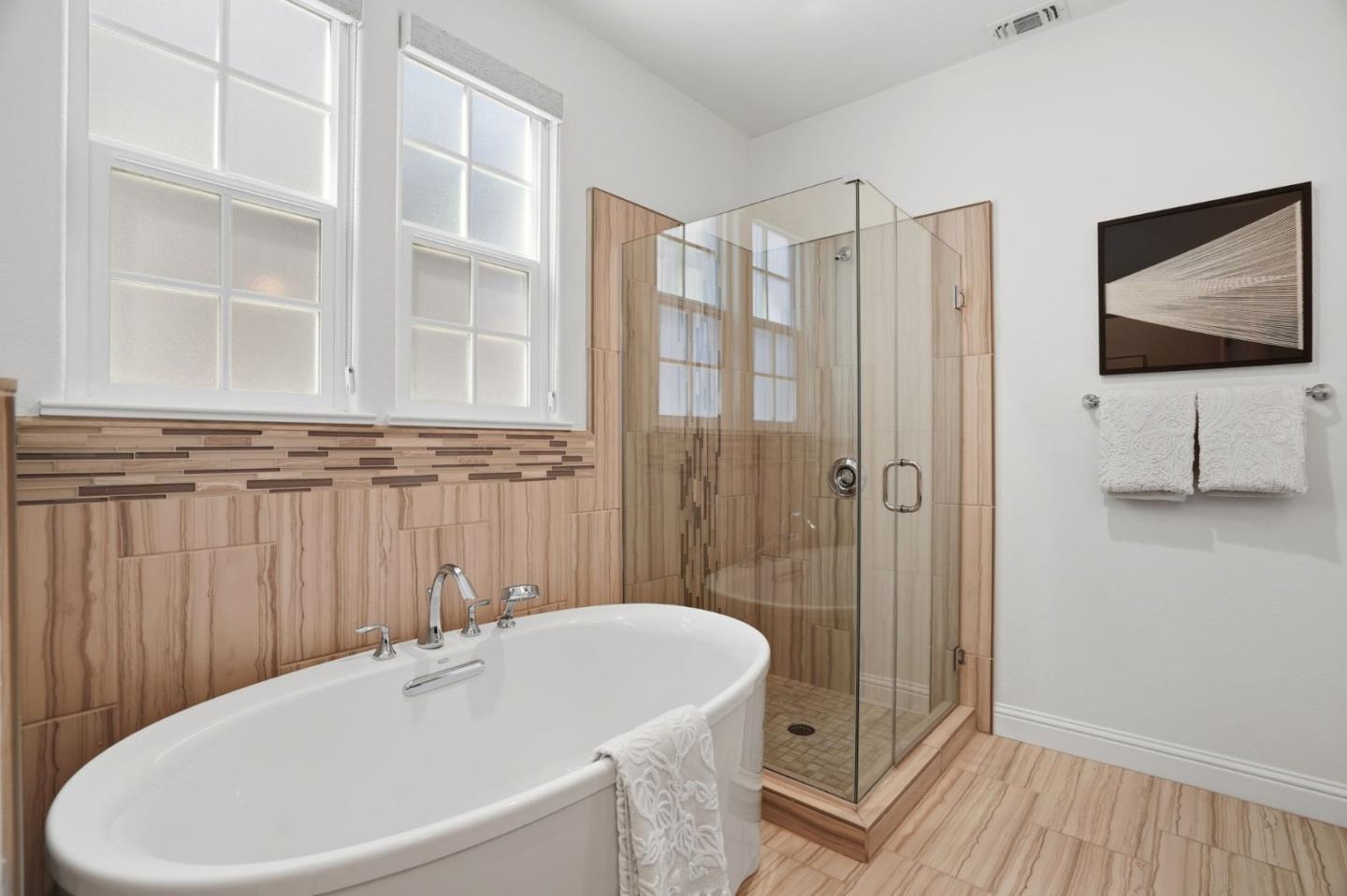 3806 Pyramid Way Mountain View, CA 94043 - Photo 31 of 44 a bathroom with a bathtub and a shower