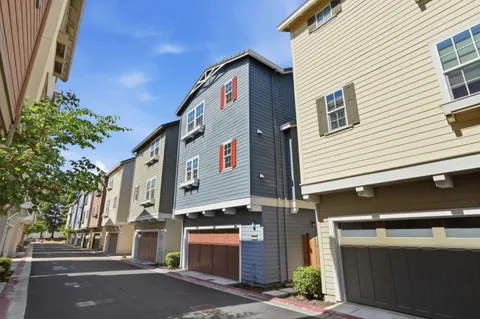 a front view of a house with a garage