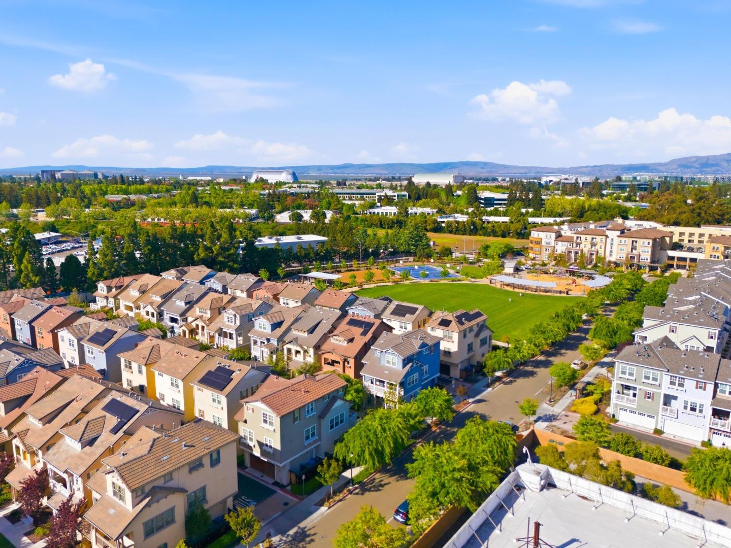 3806 Pyramid Way Mountain View, CA 94043 - Photo 41 of 44 a view of a city with lots of residential buildings ocean and mountain view in back