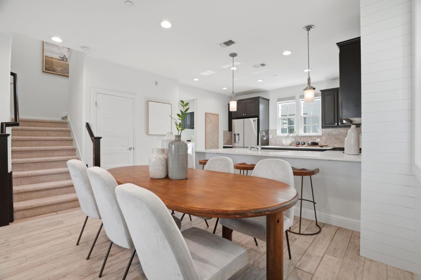 3806 Pyramid Way Mountain View, CA 94043 - Photo 9 of 44 a dining room with furniture and wooden floor