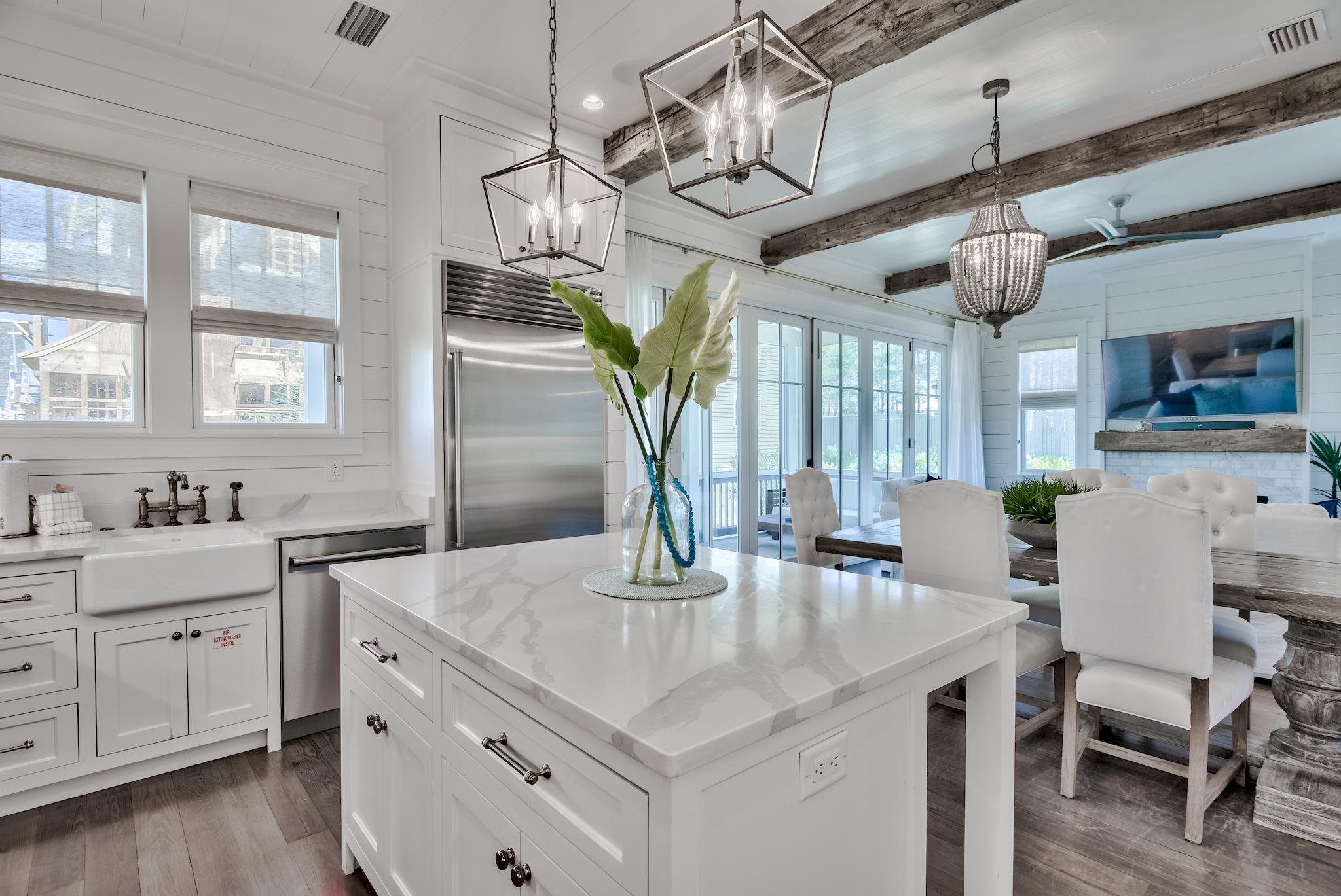 17 Patience Ln Inlet Beach Inlet Beach, FL 32461 - Photo 19 of 59 a kitchen with stainless steel appliances granite countertop a sink a counter space and wooden floor