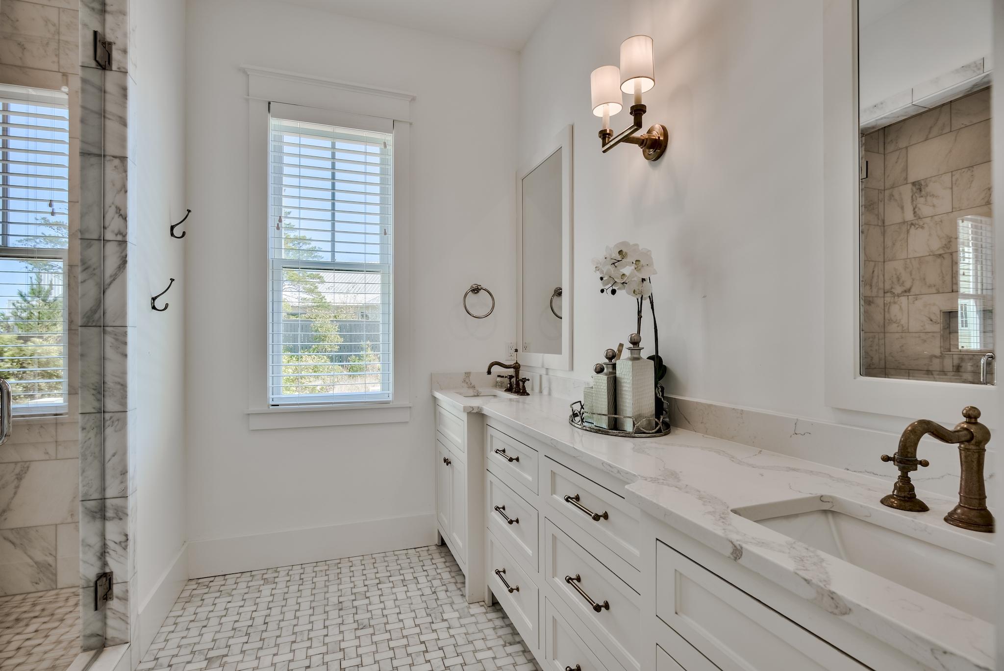 17 Patience Ln Inlet Beach Inlet Beach, FL 32461 - Photo 28 of 59 a bathroom with a sink and a mirror