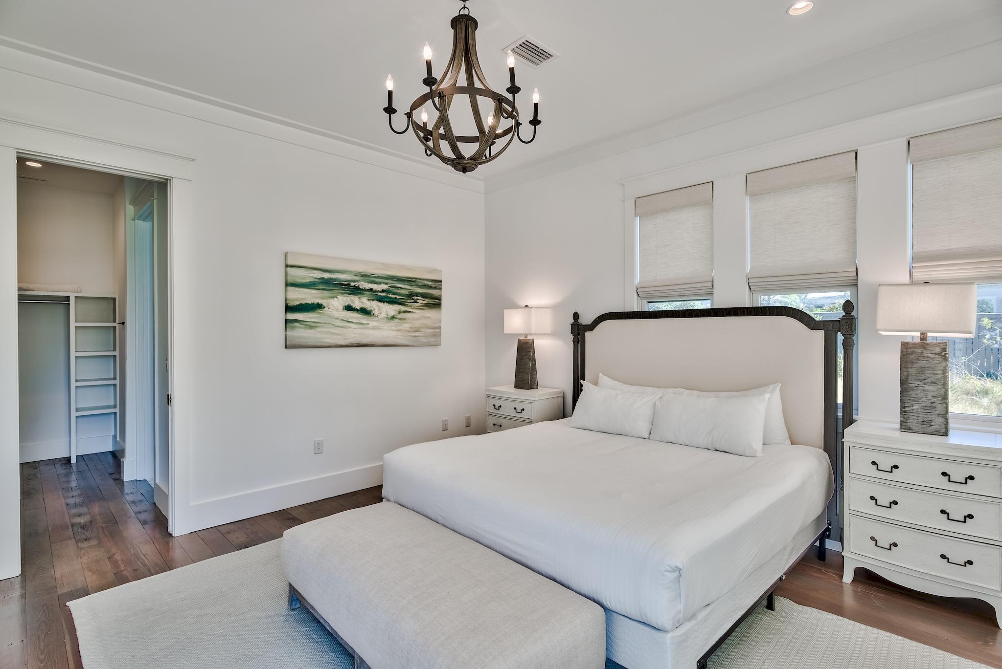 17 Patience Ln Inlet Beach Inlet Beach, FL 32461 - Photo 30 of 59 a bedroom with a bed and a chandelier