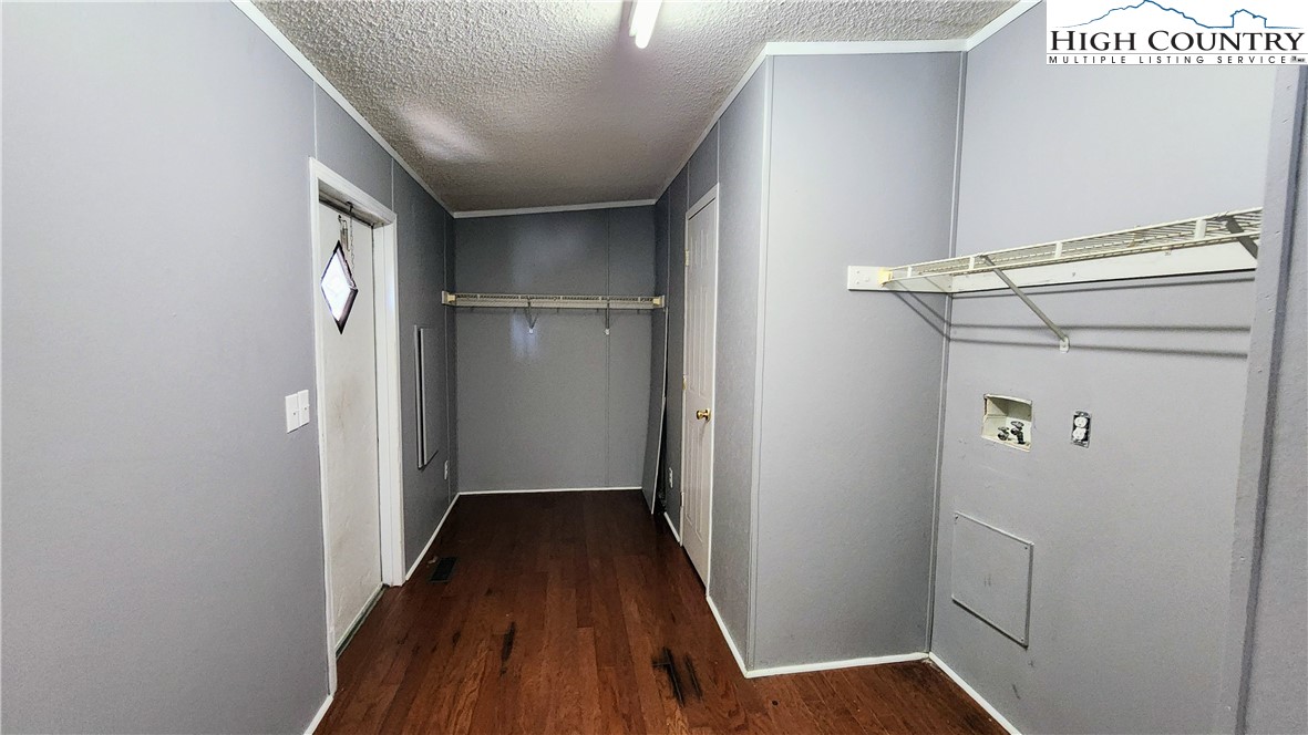 68 Rhoneys View Road Newland, NC 28657 - Photo 28 of 37 a view of a hallway with wooden floor