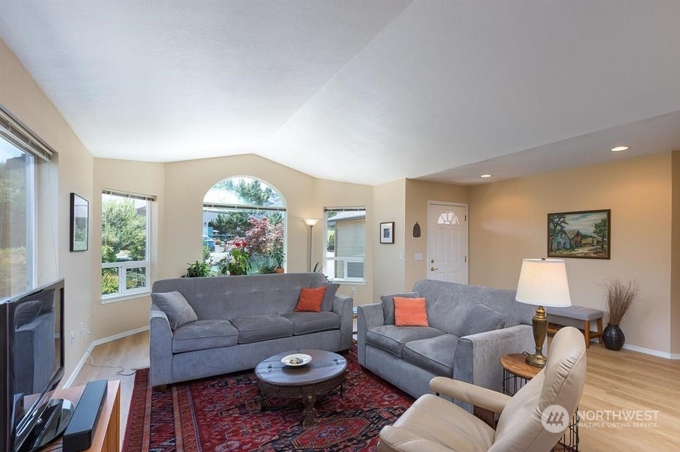41 Onyx Lane Sequim, WA 98382 - Photo 12 of 40 a living room with furniture and a large window