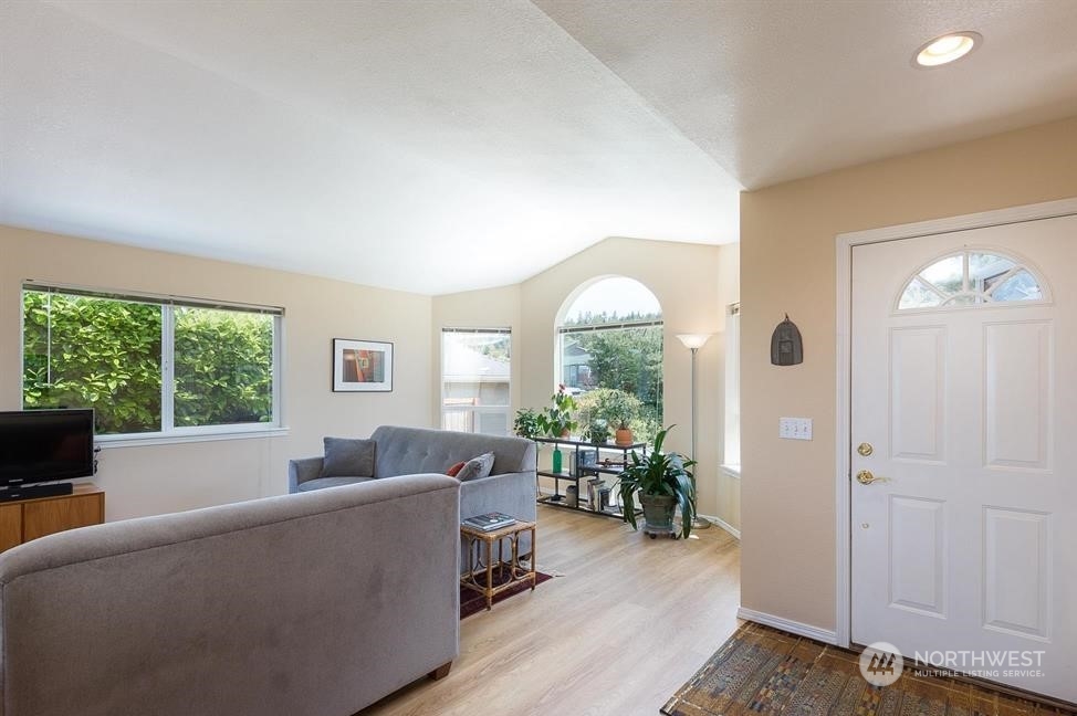 41 Onyx Lane Sequim, WA 98382 - Photo 14 of 40 a living room with furniture and a large window